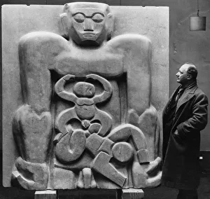 Sculptor Jacob Epstein seen here at the Leicester Square Gallery with his piece Primeval Sculptor Jacob Epstein seen here at the Leicester Square Gallery with his piece Primeval