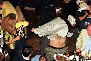 Sean Connery takes off shirt June 1998 and puts on Scottish top given to him by his wife Sean Connery takes off shirt June 1998 and puts on Scottish top given to him by his wife