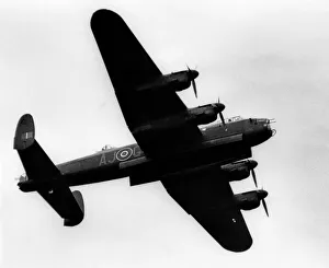 A Second World War Avro Lancaster bomber flies past at Teesside Airport. August 1981 A Second World War Avro Lancaster bomber flies past at Teesside Airport. August 1981
