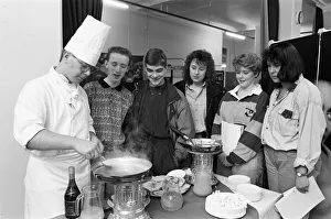 Second year student Simon Taylor makes flamb? pancakes in brandy for school pupils Second year student Simon Taylor makes flamb? pancakes in brandy for school pupils