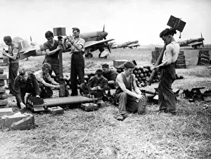 Servicing commandos of the RAF have a busy time on the Normandy airfields assembling Servicing commandos of the RAF have a busy time on the Normandy airfields assembling