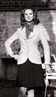 Sex change model April Ashley wearing a white blazer polka dot scarf Sex change model April Ashley wearing a white blazer polka dot scarf