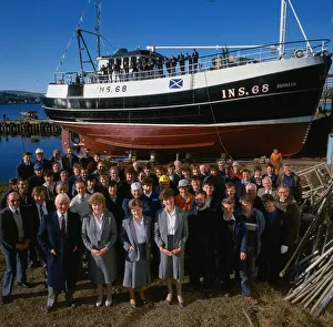 Ship Sunbeam workforce line up in front of fishing boat. February 1987 Ship Sunbeam workforce line up in front of fishing boat. February 1987