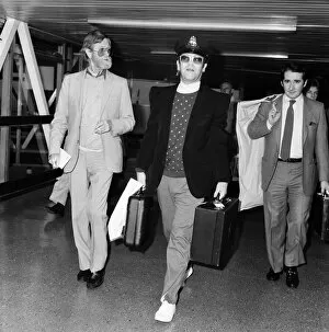 Images Dated 21st August 1982: Singer Elton John, arrives at Heathrow airport from his 10 week tour of the States