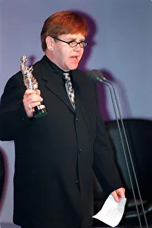 Singer Elton John at the Ivor Novello Awards at Grosvenor House in Park Lane London Singer Elton John at the Ivor Novello Awards at Grosvenor House in Park Lane London