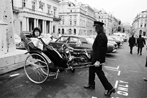 Singer Marc Bolan in a rickshaw in London. Drawing the rickshaw is Alphie O'Leary Singer Marc Bolan in a rickshaw in London. Drawing the rickshaw is Alphie O'Leary