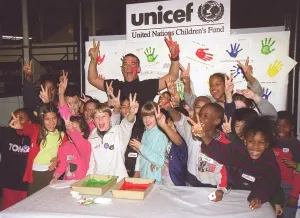 Singer Robbie Williams gets his hands dirty. November 1999. For Unicef Singer Robbie Williams gets his hands dirty. November 1999. For Unicef