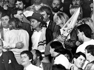 Images Dated 10th September 1985: Singer Rod Stewart and girlfriend Kelly Emberg pictured at Ninian Park before the Wales v