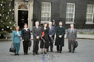 Sinn Fein leader Gerry Adams flanked by his party deputies faces the media outside Number Sinn Fein leader Gerry Adams flanked by his party deputies faces the media outside Number