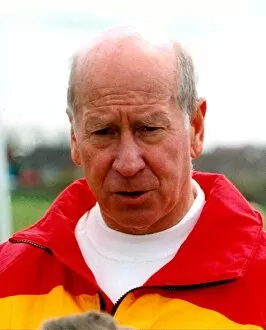 Images Dated 1st May 1996: Sir Bobby Charlton gives tips to youngsters on Bullocksteads Sports Ground in May 1996 in