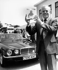 Sir John Egan shows the Queens Award for Export Achievement presented to him today by Sir John Egan shows the Queens Award for Export Achievement presented to him today by