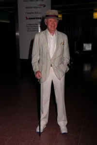 Sir John Mills Actor April 98 Arriving at Heathrow tovist family and friends Sir John Mills Actor April 98 Arriving at Heathrow tovist family and friends