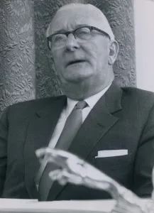 Sir William Lyons who is the founder and chairman of Jaguar Cars, in his office Sir William Lyons who is the founder and chairman of Jaguar Cars, in his office