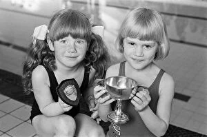 Images Dated 22nd April 1985: Six-year-old swimmer Charlotte Ann St Clair (right) is the '