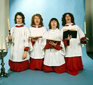 Slade dressed in choir boy outfits Christmas setting with candles Slade dressed in choir boy outfits Christmas setting with candles
