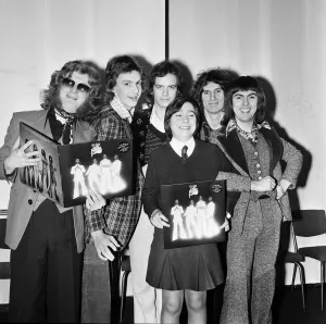 Slade (l-r Noddy Holder, Jim Lea, Don Powell and Dave Hill) pictured with prize winners Slade (l-r Noddy Holder, Jim Lea, Don Powell and Dave Hill) pictured with prize winners
