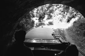 A small pleasure craft seen here emerging from the Chirk Tunnel on the Llangollen Canal A small pleasure craft seen here emerging from the Chirk Tunnel on the Llangollen Canal