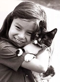 Images Dated 1st October 1970: Smiling Carol Riley of Ealing collects her pet cat Cupid after he was released