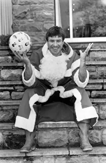 Soccer star Emlyn Hughes pictured as Santa Claus at his home in Sheffield Soccer star Emlyn Hughes pictured as Santa Claus at his home in Sheffield