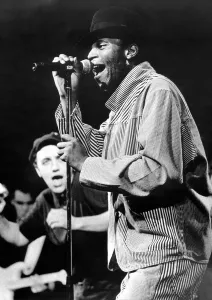 Special Beat singer Rankin Roger(striped shirt) on stage at the Tic Toc club in Coventry Special Beat singer Rankin Roger(striped shirt) on stage at the Tic Toc club in Coventry
