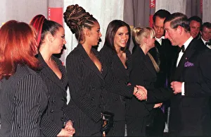 Spice Girls Geri Halliwell Mel C Mel B look on as Victoria Adams shakes hands with Prince Spice Girls Geri Halliwell Mel C Mel B look on as Victoria Adams shakes hands with Prince
