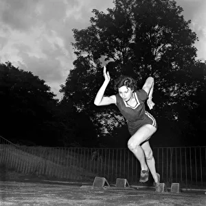 Sport Athletics: Jean off the a flying start from the blocks in a practice start Sport Athletics: Jean off the a flying start from the blocks in a practice start