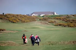 Sport - Golf - Royal Porthcawl - A general shot of golfers playing the course at Royal Sport - Golf - Royal Porthcawl - A general shot of golfers playing the course at Royal