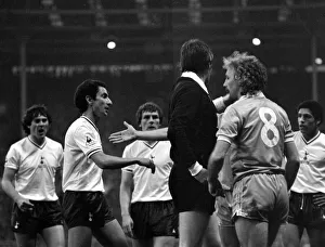 Spurs players argue with the referee l-r Steve Perryman, Ossie Ardiles Spurs players argue with the referee l-r Steve Perryman, Ossie Ardiles
