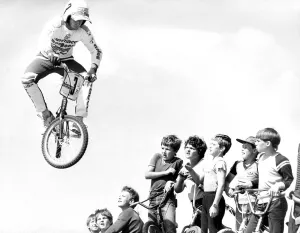 Startled BMX children watch as Pete Middleton demonstrates his skill Startled BMX children watch as Pete Middleton demonstrates his skill