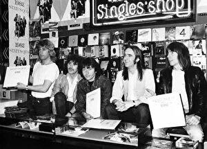 Images Dated 5th May 1982: Status Quo signing their new record at London HMV store
