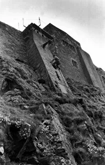 Images Dated 10th November 1988: Steeplejack David Stone at work on Lindisfarne Castle on 10th November 1988