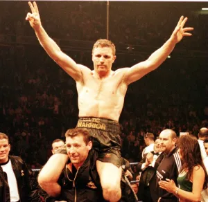 Steve Collins celebrates after beating Nigel Benn in the WBO middleweight fight in Steve Collins celebrates after beating Nigel Benn in the WBO middleweight fight in