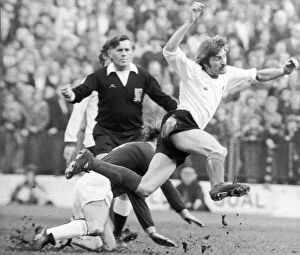 Images Dated 8th March 1975: Steve Heighway of Liverpool flies through air March 1975 after a tackle by Peter