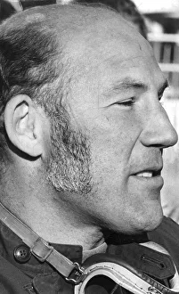 Stirling Moss in profile serious during interview at track - December 1971 Stirling Moss in profile serious during interview at track - December 1971