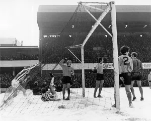 Stoke 1 v Wolves 1. 14th February 1970. Smith of Stoke on ground in net after scoring Stoke 1 v Wolves 1. 14th February 1970. Smith of Stoke on ground in net after scoring