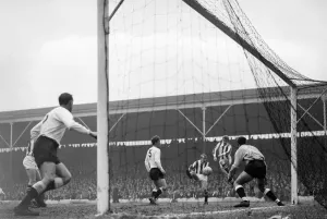 Stoke 3 v. Fulham 1 1965 League campaign Stoke half back Palmer has his shot Stoke 3 v. Fulham 1 1965 League campaign Stoke half back Palmer has his shot