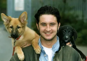 Stuart Wolfenden Actor with the two dogs he rescued from oldham RSPCA Named Tango Stuart Wolfenden Actor with the two dogs he rescued from oldham RSPCA Named Tango