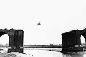 Images Dated 26th October 1982: Stunts John Taylor jumps River Blackwater without Helmet protective gear