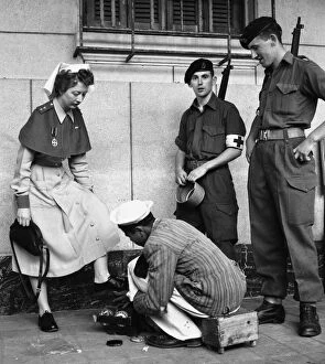 Suez Crisis 1956 British Army nurse Jean Leich has her shoes shined in Port