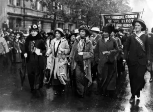 Suffragettes marching in support of some of their members who were on hunger strike Suffragettes marching in support of some of their members who were on hunger strike