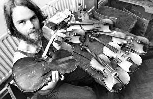 Tarquin Bolton at the Sunderland Violin Hospital in July 1980 set up to repair damaged Tarquin Bolton at the Sunderland Violin Hospital in July 1980 set up to repair damaged