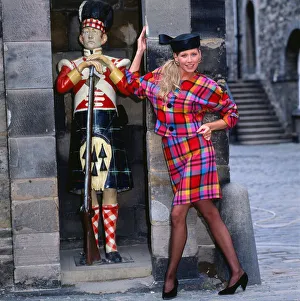 Tartan fashion, 1989 Model wearing pink tartan jacket and skirt suit Tartan fashion, 1989 Model wearing pink tartan jacket and skirt suit