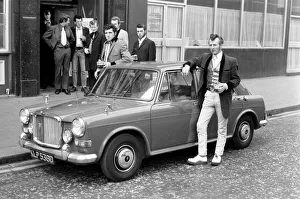 Former Teddy boys gathered outside the Rock n Roll cafe. May 1975 Former Teddy boys gathered outside the Rock n Roll cafe. May 1975
