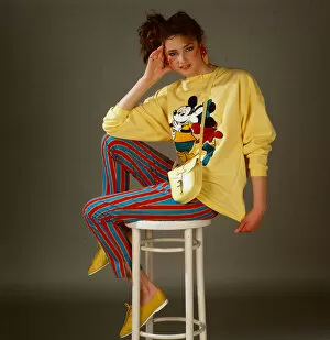 Images Dated 23rd April 1987: Teenagers dress and fashion, April 1987 Model wearing Mickey Mouse yellow