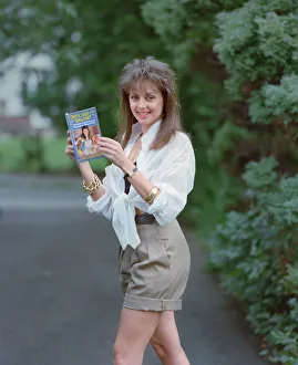 Television Presenter Carol Vorderman posing with her book Dirty Television Presenter Carol Vorderman posing with her book Dirty