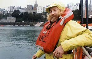 Tenby lifeboat coxswain Alan Thomas at the Tenby lifeboat station before being presented Tenby lifeboat coxswain Alan Thomas at the Tenby lifeboat station before being presented