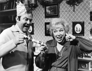 Terry & June Actor & Actress in their Christmas show pulling a cracker Terry & June Actor & Actress in their Christmas show pulling a cracker