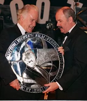 Images Dated 22nd February 1998: Terry Quinn presents Ian Bannen with his award February 1998 at the Scottish Peoples Film