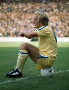 Terry Yorath sitting on a football Leeds United. December 1975 Terry Yorath sitting on a football Leeds United. December 1975