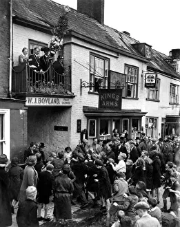 Throwing hot pennies to children at Honiton Fair Devon. The Hot Pennies ceremony takes Throwing hot pennies to children at Honiton Fair Devon. The Hot Pennies ceremony takes
